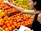 Woman Selecting Vegetables